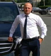 Андрей Юргилевич, водитель бизнес-такси