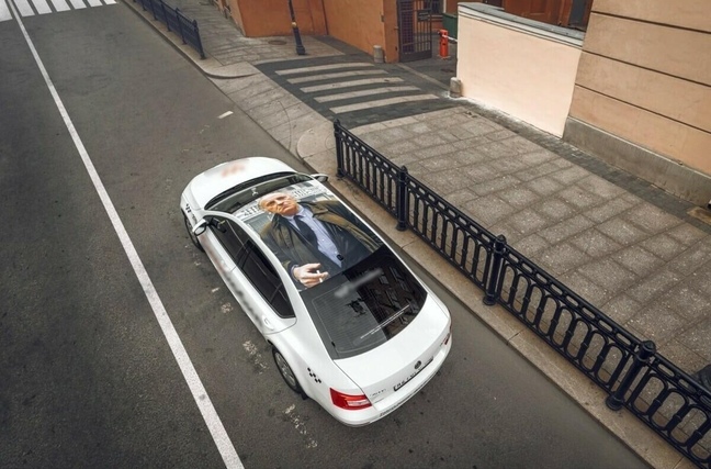 Не мытьем, так катаньем: портрет Бродского появился на крышах петербургского такси